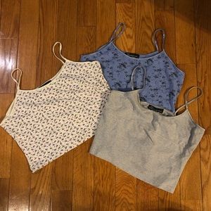 3 women’s cropped tank tops. Like new!
